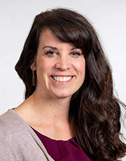 Woman smiling.