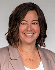 Woman smiling.