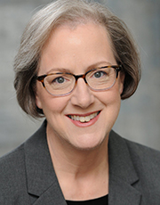 Woman smiling.