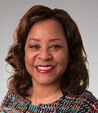 Woman smiling.