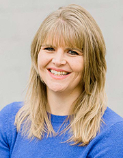 Woman smiling.